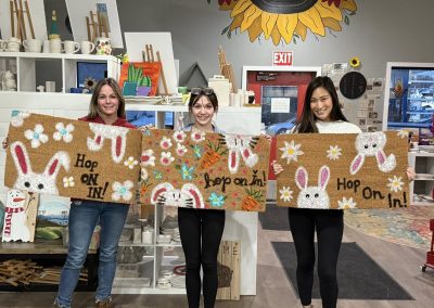 Hop On It door mat with bunnies flowers and carrots